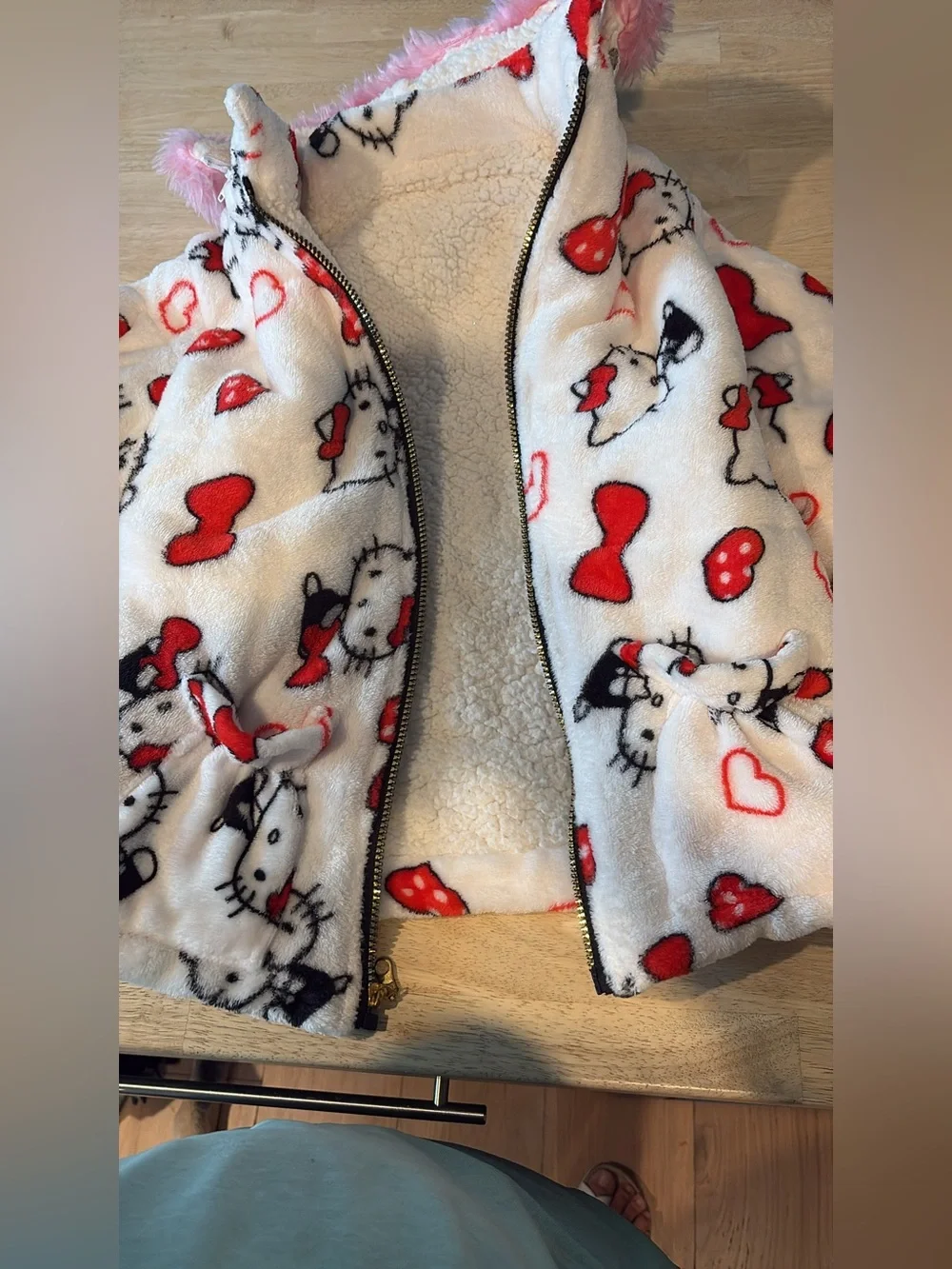 Hello Kitty White Plush Zip-Up Hoodie with Red Accents and Pink Fur Hood Trim